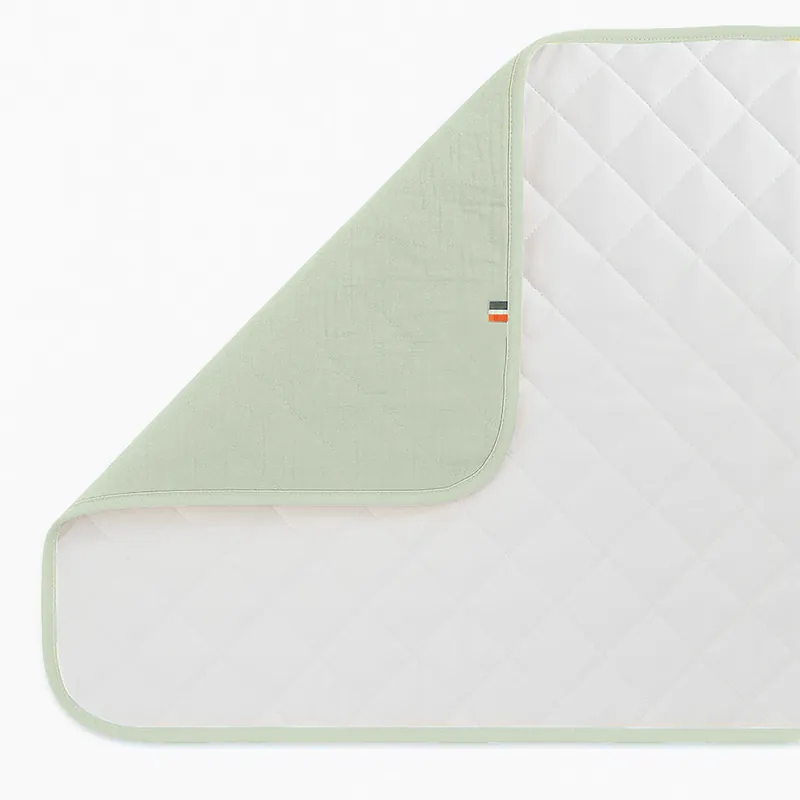 Imprescindible (Must-Have) Alfombrilla De Cambiar Nomada En Algodón Bio Verde